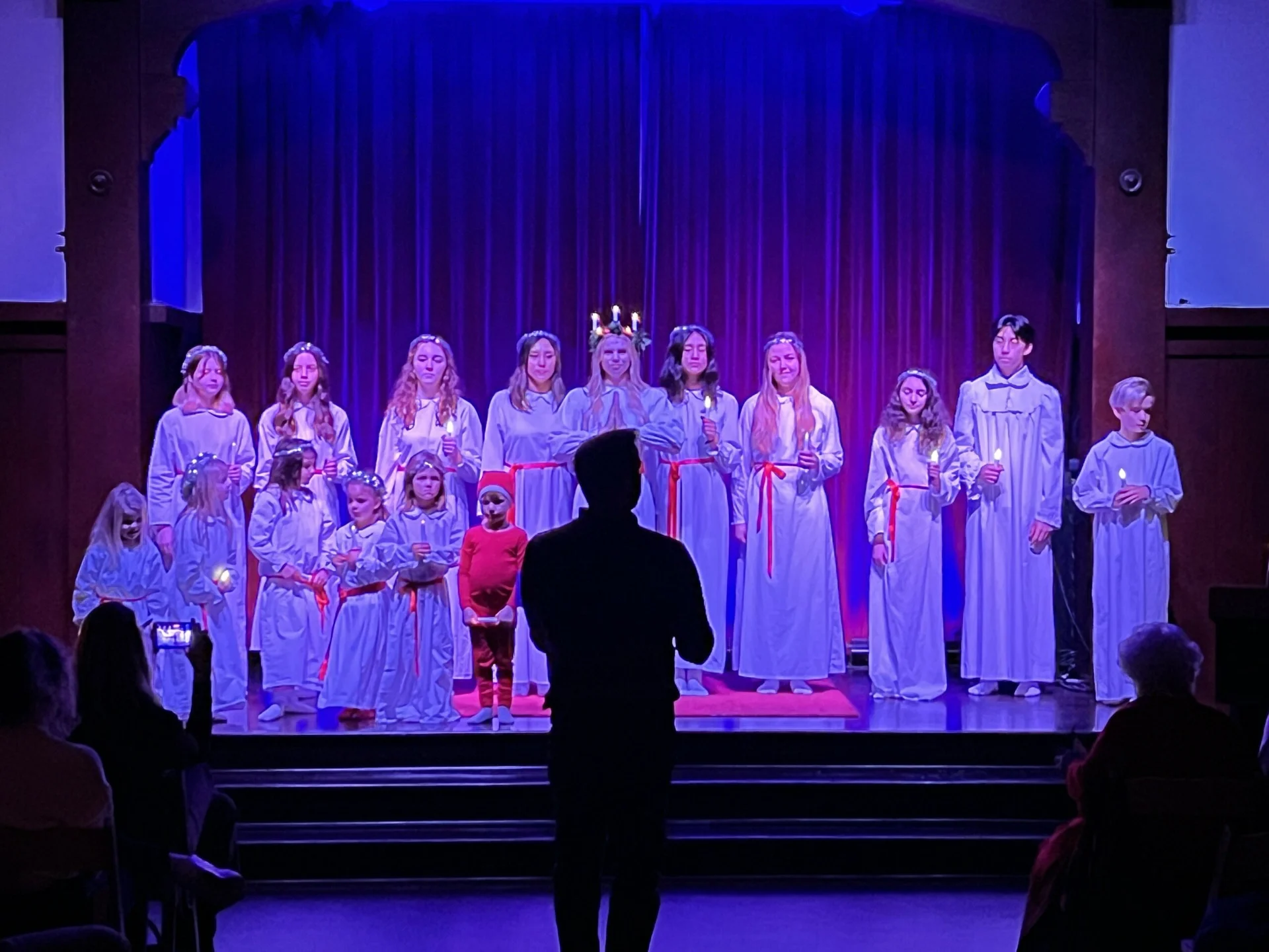 Lucia Choir singing on stage